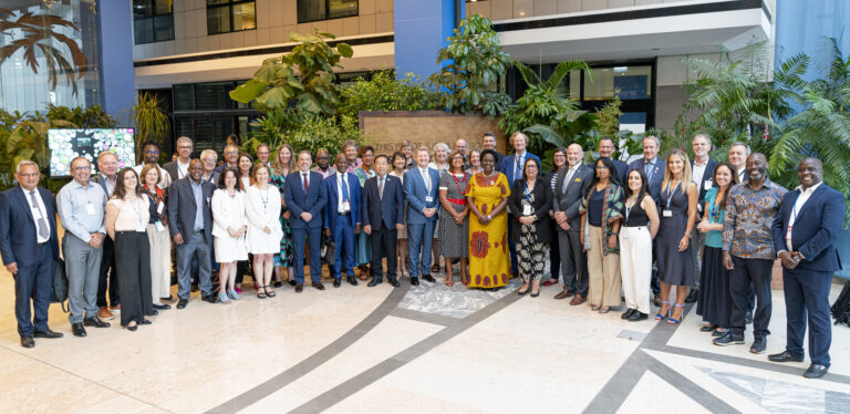 A large group of people standing together for a group photo