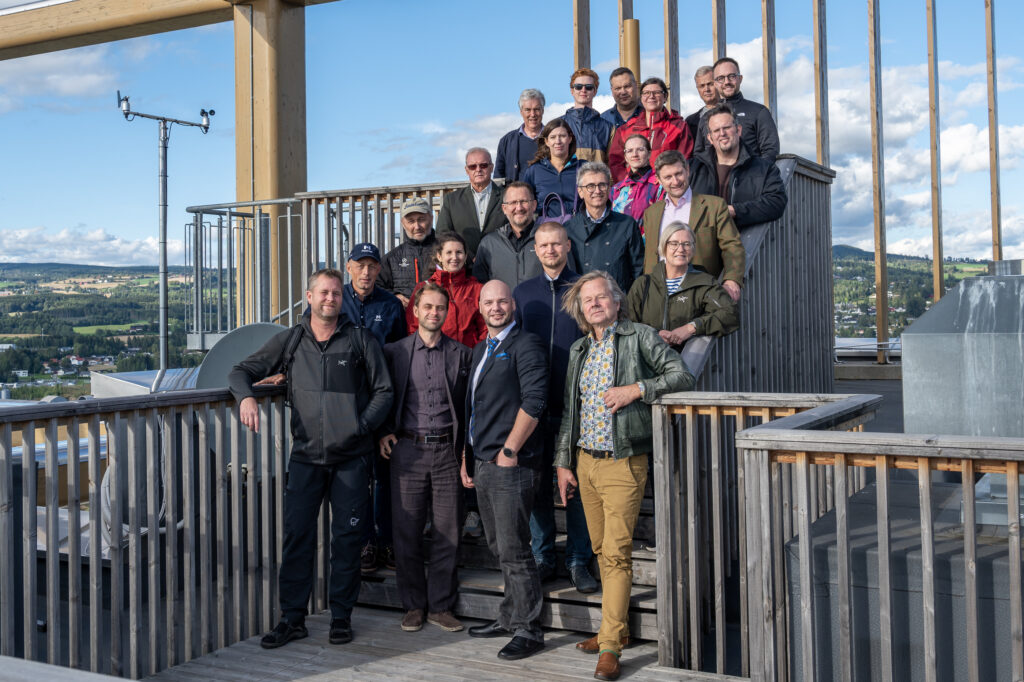 A group of people standing on a staircase for a group photo